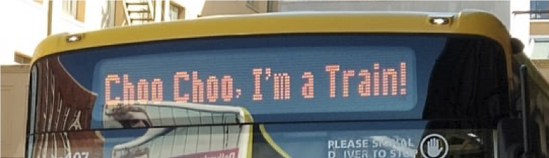 Top of bus display, saying "Choo Choo I'm a Train!"