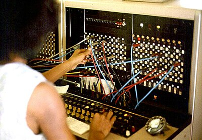 Photo of person at an analogue switchboard