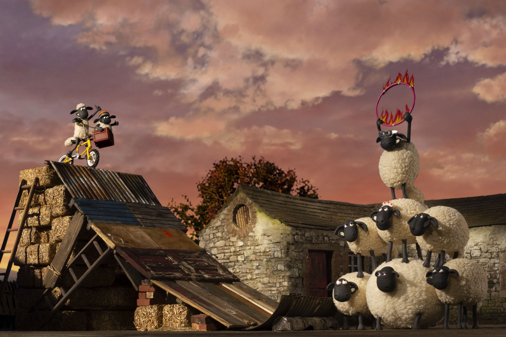 Shaun the sheep still - Shaun has set up a stunt bike setup with a ring for a bike to jump through