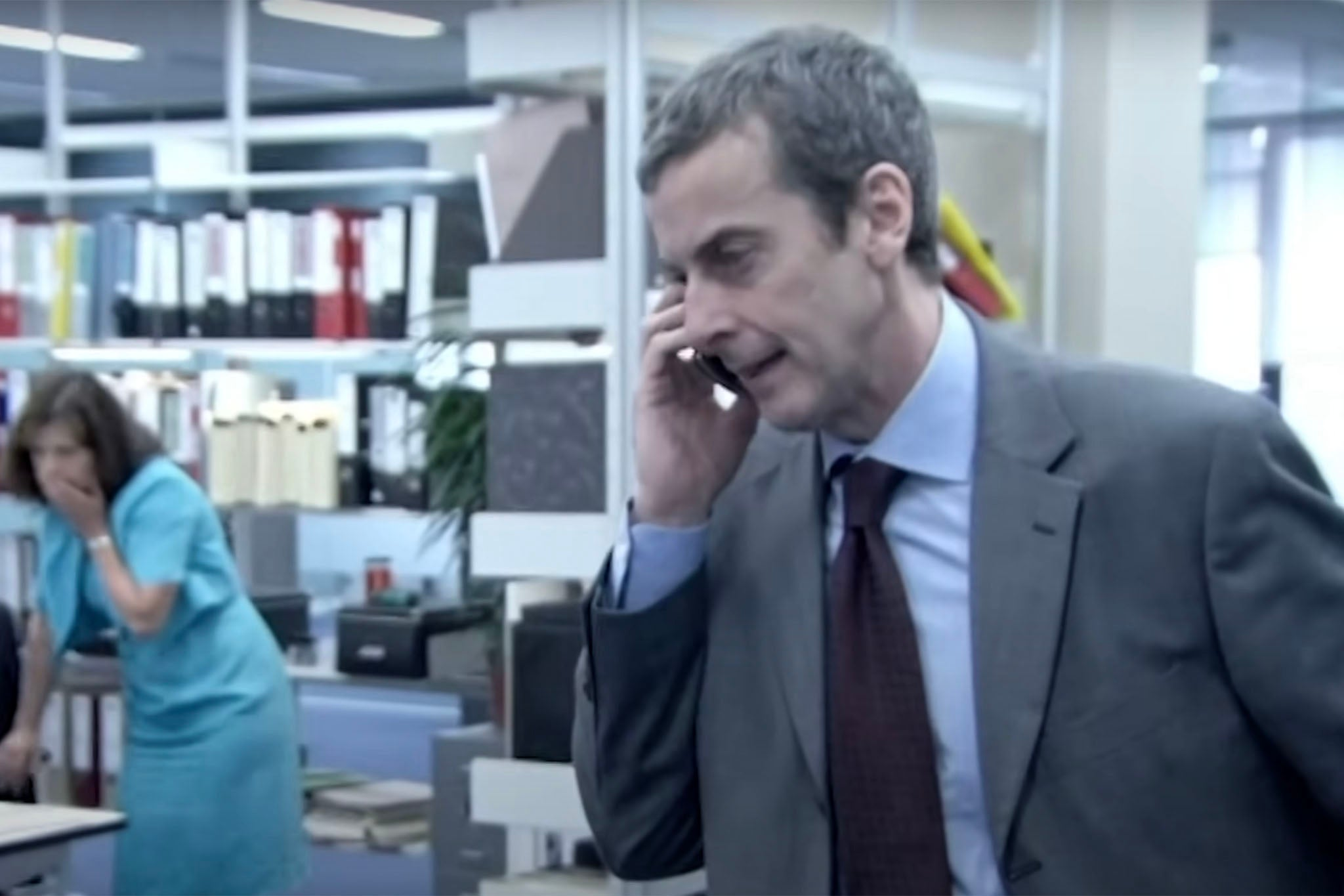 Still from The Thick Of It, showing Malcolm Tucker on the phone